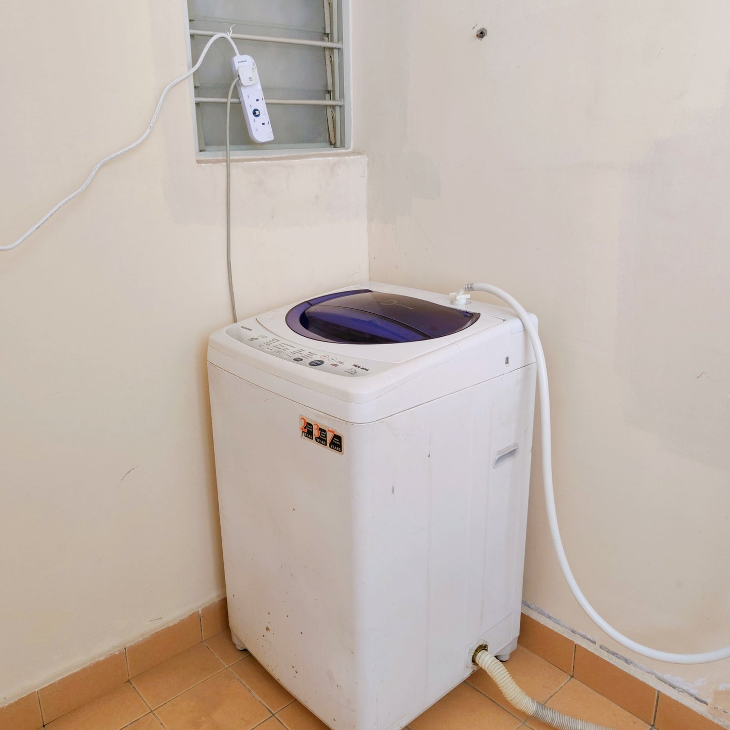 Washing machine inside a house for rent at Aman Heights Seri Kembangan