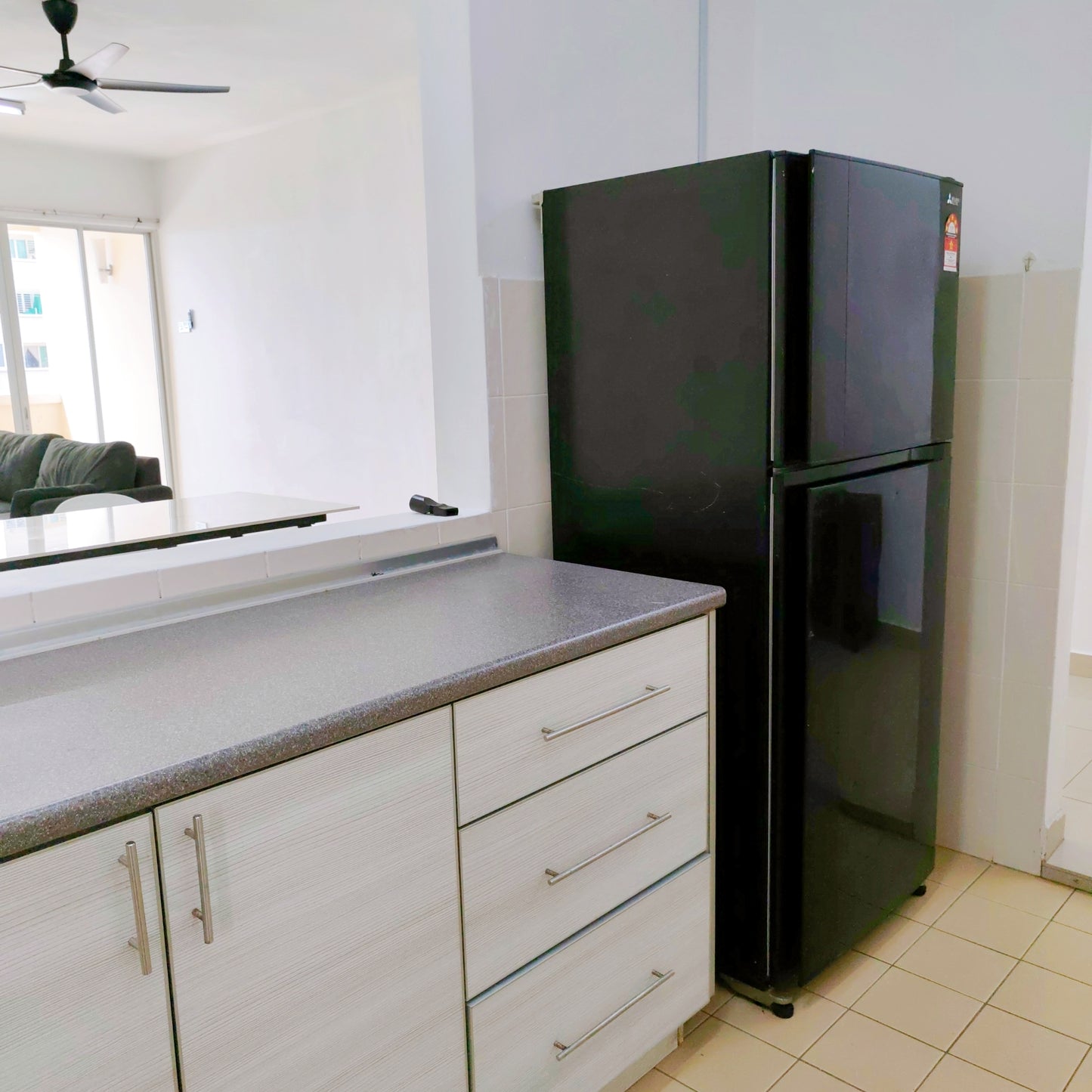 Kitchen area of a furnished 3 rooms house for rent at Aman Heights, Seri Kembangan