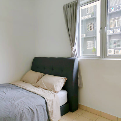 A nice bed in a Middle room inside a house for rent with windows overlooking opposite building at Aman Heights
